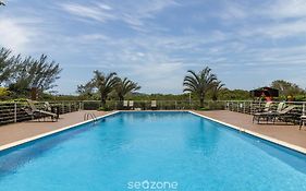 Apto pé na areia c/ piscina e churrasq. VIC0203